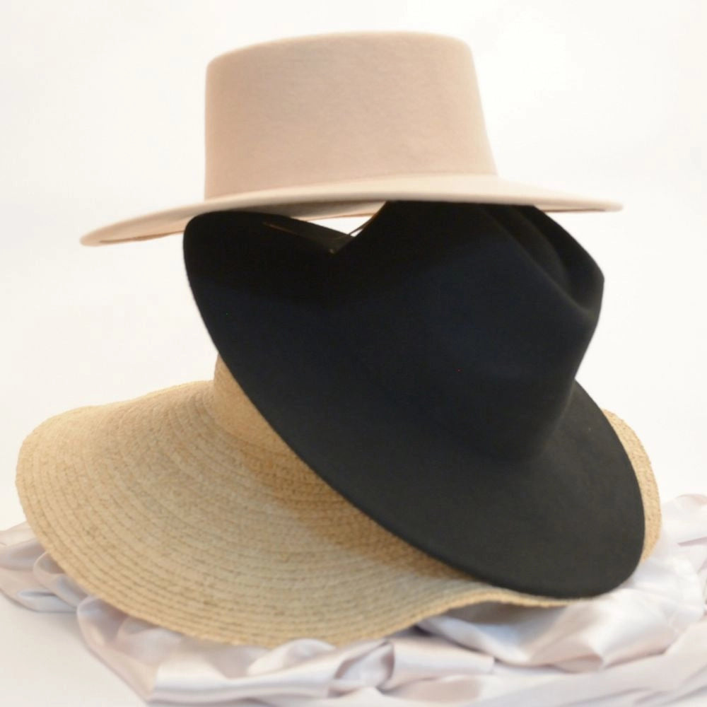 Three luxury satin lined hats stacked on top of each other.